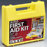 Large first aid kit with compartmental dividers for use in the auto and RV. Contents specifically designed for use on the road with motion sickness tablets, accident report form, call police flag, and a variety of first aid items arranged in compartmental organizers.